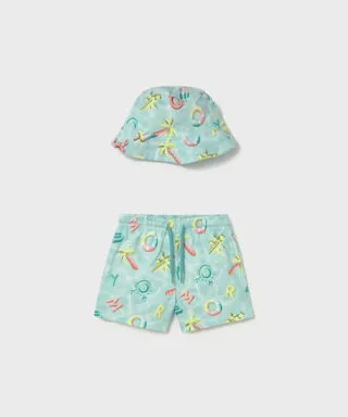 Conjunto de bañador y gorro reversible piscina AGUAMARINA