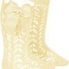 Calcetines altos perlé calados con lazo grogrén AMARILLO