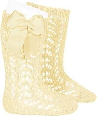 Calcetines altos perlé calados con lazo grogrén AMARILLO